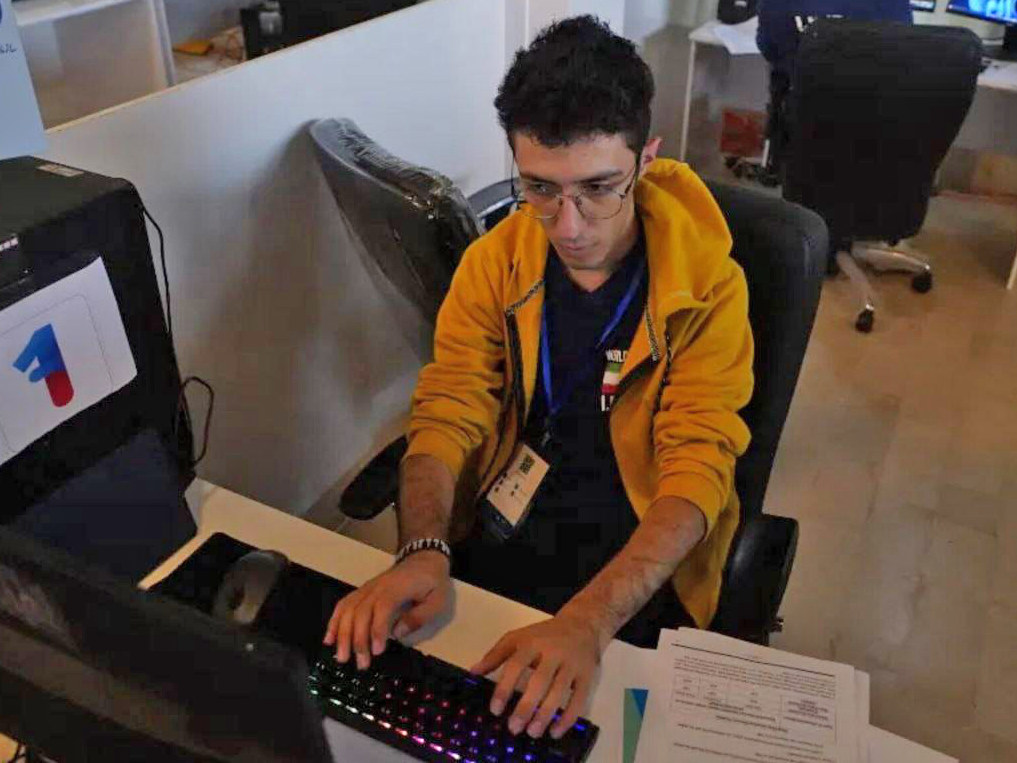 A competitor typing at a computer during the first International Friendly Skills Competition (IFSC) from 11 to 17 May 2024.