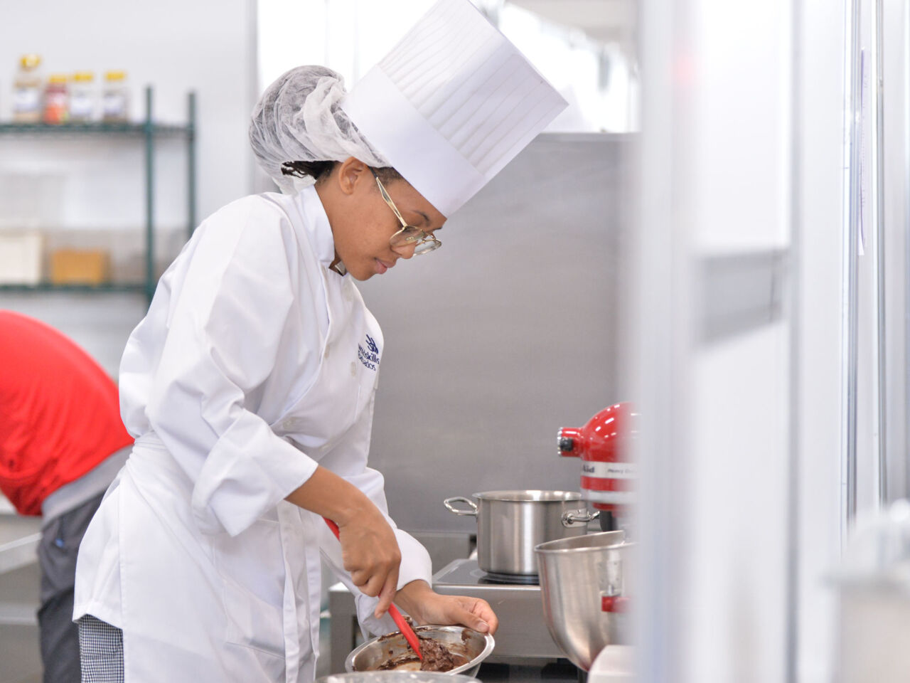 Shae White competes in cooking at WorldSkills Kazan 2019.
