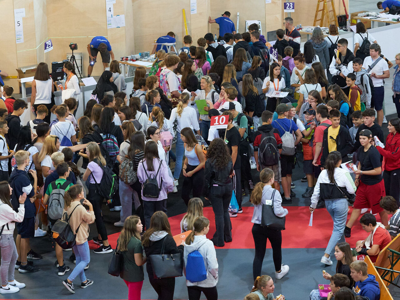 A crowd of school children watching the Competitors during the WorldSkills Italy nationals in Bolzano, South Tyrol.
