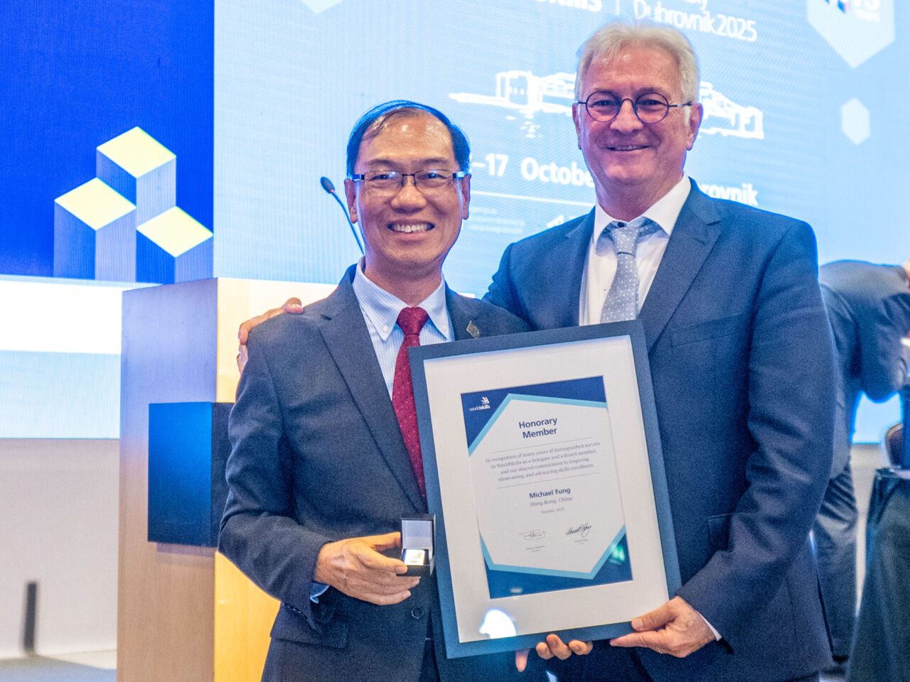 Michael Fung, Board member – Competitions, receiving recognition for his term on the WorldSkills Board at WorldSkills General Assembly 2025.
