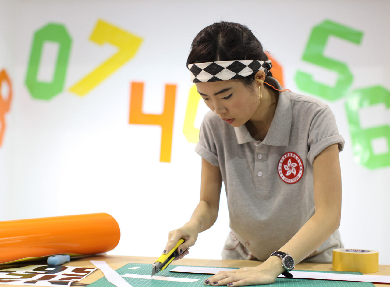 Pearl So competing in WorldSkills São Paulo 2015, in Visual Merchandising.