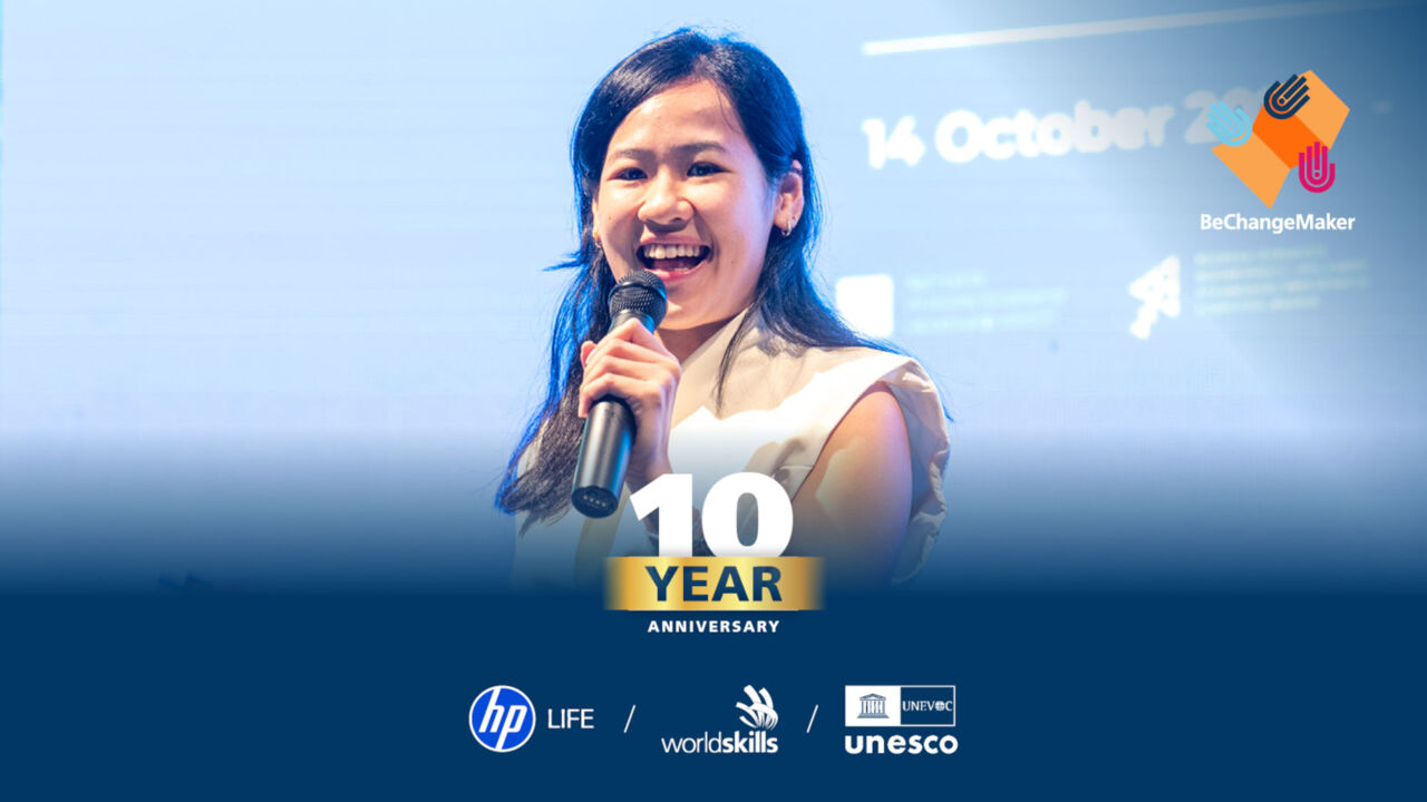 One of the participants of the BeChangeMaker programme on stage during their pitch.