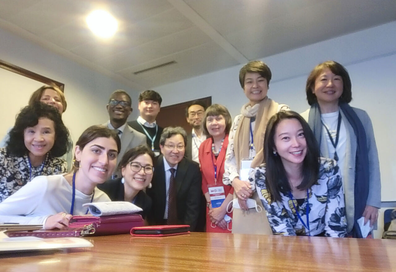 Participants pose for a photograph during a Pre-Summit meeting before the UNESCO Transforming Education Summit.