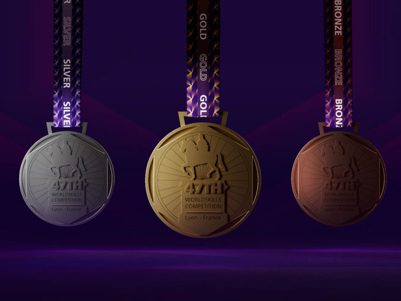 Verso side of the WorldSkills Lyon 2024 medals: silver, gold, and bronze (from left to right).