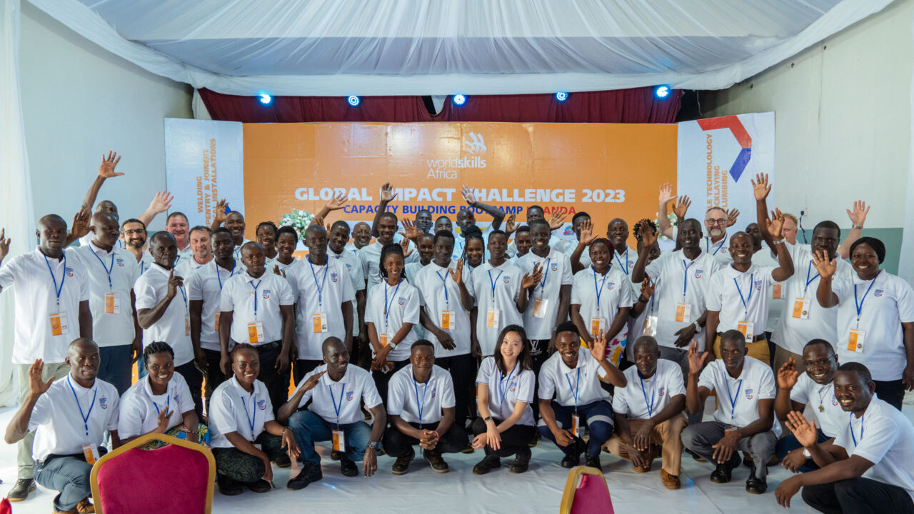A large group photo of participants of the Global Impact Challenge programme Ugandan capacity building bootcamp in May 2023.