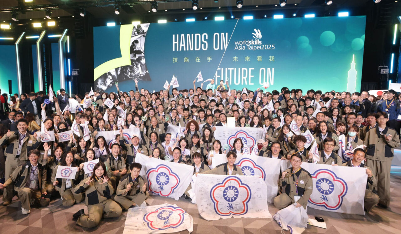 Hundreds of Competitors pose for a group shot during WorldSkills Asia Taipei 2025 at the Taipei Nangang Exhibition Center.